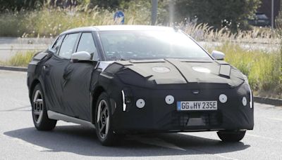 Kia EV4 spied testing with funky, concept car-like design | Auto Express