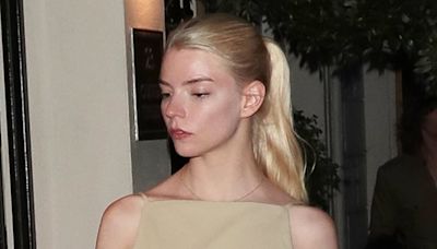 Anya Taylor-Joy and Malcolm McRae watch Cara Delevingne in Cabaret