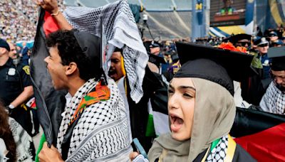 Small anti-war protest ruffles University of Michigan graduation ceremony