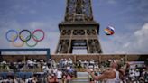 At the Olympic beach volleyball venue, the Eiffel Tower stars in a très French show