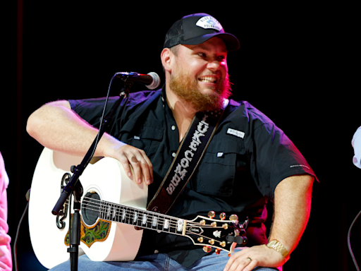 Watch Luke Combs Hilariously Make Fantasy Football League Losers Join Him On Stage, Perform: 'The Stakes Are...