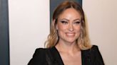 Olivia Wilde Debuts Newly Cut 'French Girl' Bangs With A Knotted Doughnut Updo