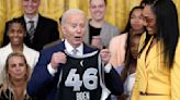 ...Vice President Kamala Harris are presented jerseys...celebrate their record-breaking season and victory in the 2023 WNBA...East Room at the White House in Washington, ...