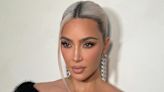 Kim Kardashian shows off new ice blonde look in glamorous photos