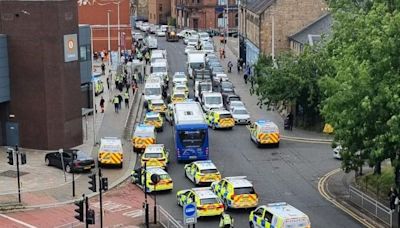 Police swarm Govan street amid reports of major ongoing incident