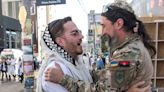 Azov fighter hugs Hasidic pilgrim in Uman during Rosh Hashanah celebrations — Photo of the Week