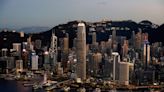 Hong Kong adds security law clauses to land sales, property stocks drop