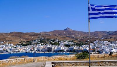 Greek island with beautiful views like Mykonos but without hordes of tourists