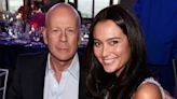 Bruce Willis cozies up to wife Emma Heming in rare peek inside their private celebration with daughters Mabel and Evelyn