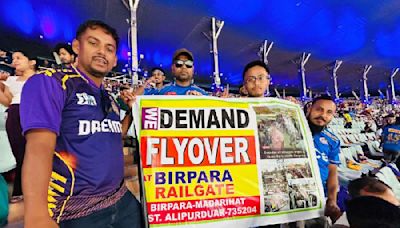 Youths raise pitch for rail overbridge: Birpara's 5 display banner with demand at Eden Gardens