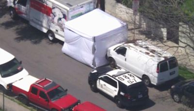 Police investigate body found inside parked truck in Los Angeles