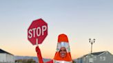 This Utah mom wanted to make school crosswalks safer. So she dressed up as a traffic cone.