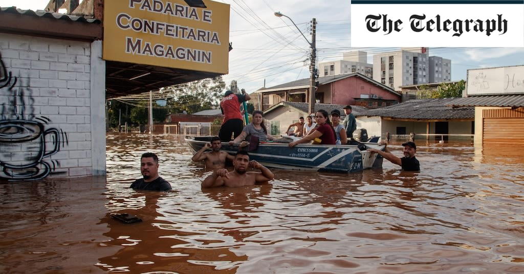 Flooded World Cup stadium closes after Brazil battered by torrential rain