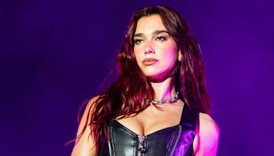 Dua Lipa is the ultimate biker babe in a leather corset and zipped thong hotpants