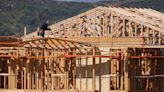 US single-family housing starts hit eight-month low; green shoots in manufacturing