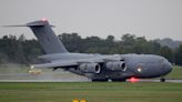 Plane carrying Queen Elizabeth II's coffin lands in London