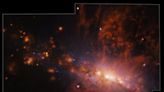 Giant galactic explosion exposes galaxy pollution in action