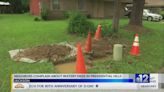 Presidential Hills neighbors concerned about holes being dug in yards