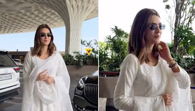 Kriti Sanon Is A Complete Vision In White As She Steps Out From Her Swanky Maybach At The Airport; Watch...