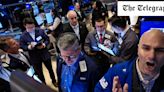 Dow Jones hits record milestone as US bets on faster rate cuts