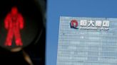 China Evergrande first-half net loss narrows to $4.5 billion
