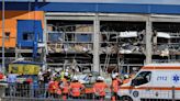 Explosion and fire injure 13 at Romanian home-improvement store