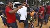 Race car in Sri Lanka veers off track killing 7 people and injuring 20, officials say