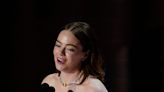 At the Oscars, Emma Stone beats Lily Gladstone in closely watched best actress race