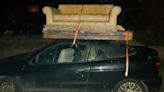 ‘Ridiculous’ driver disqualified for driving with sofa on roof of convertible