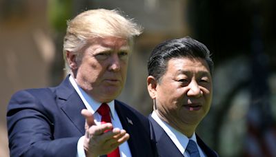 Trump defends flip-flopping on labeling China a currency manipulator