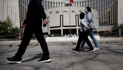 China cuts short and long-term rates