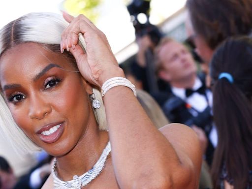 Kelly Rowland alleges she was racially profiled on a Cannes red carpet after video of her appearing to clash with an usher goes viral