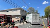 Tractor-trailer crash shuts down Route 23 in Cedar Grove, damages building, 2 hospitalized