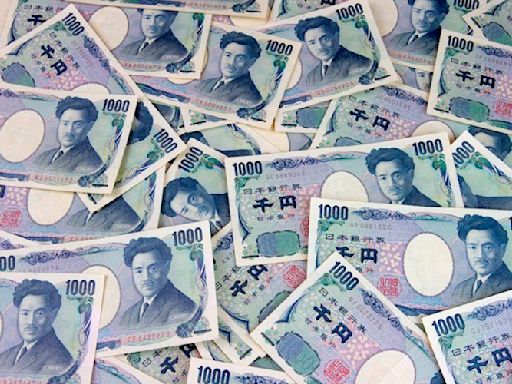 Japanese Yen fades possible intervention-led gains, slides below 156.00 against USD