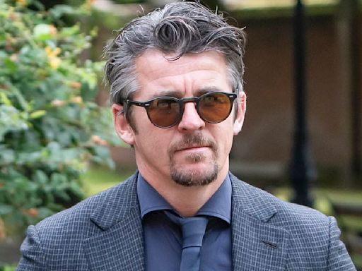 Joey Barton arrives at court accused of malicious communications