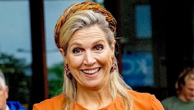 Queen Maxima of the Netherlands looks chic as she opens new clinic