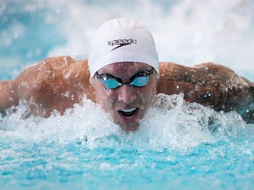 Tokyo Olympic star Caeleb Dressel makes his debut at US swim trials, advancing in the 100 free