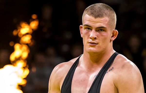 Ben Kueter to temporarily step away from Iowa football to focus on wrestling, will return in 2025