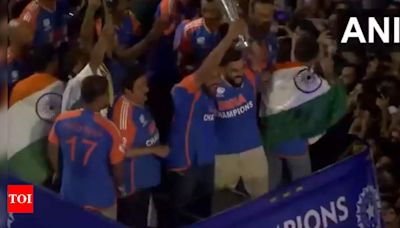 Victory Parade: Rohit and Virat lift T20 World Cup together amid fans' cheers. Watch | Cricket News - Times of India