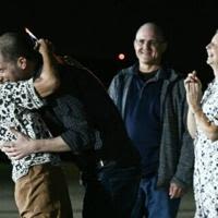 The most high profile prisoner was Gershkovich, 32, pictured hugging his mother on his return to the US