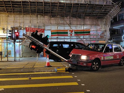 深水埗的士避車剷安全島撞歪交通燈 女乘客擦傷面送院