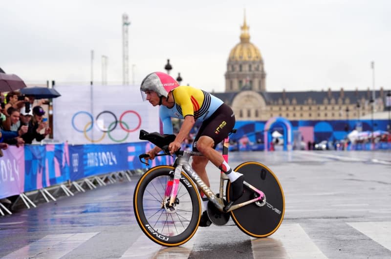 World champion Evenepoel wins Olympic time trial gold for Belgium
