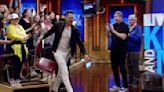 Watch Joel McHale steal unsuspecting audience member's chair during wild Live With Kelly & Mark entrance