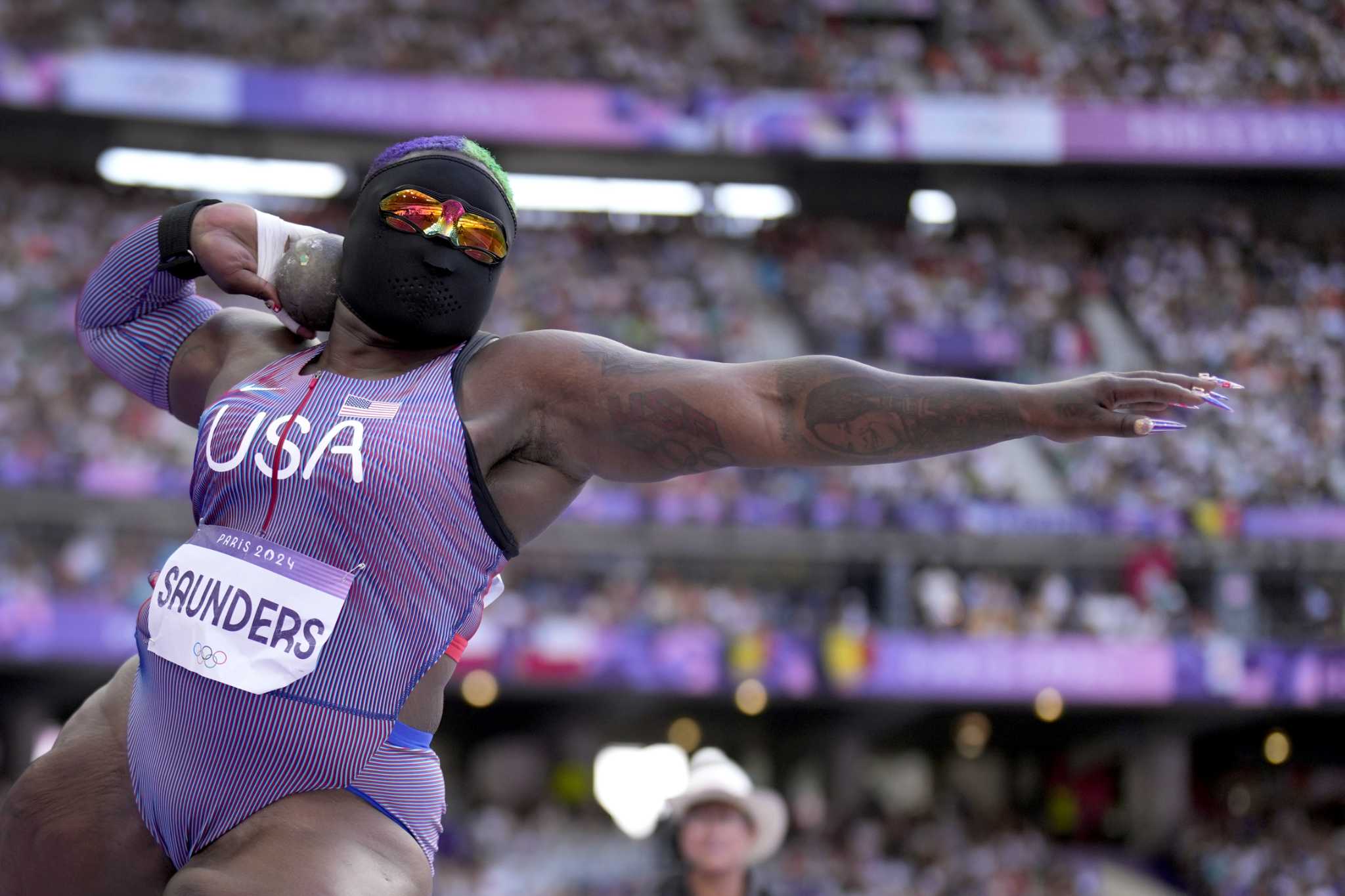 Raven Saunders, the masked shot putter who won silver in Tokyo, qualifies for final