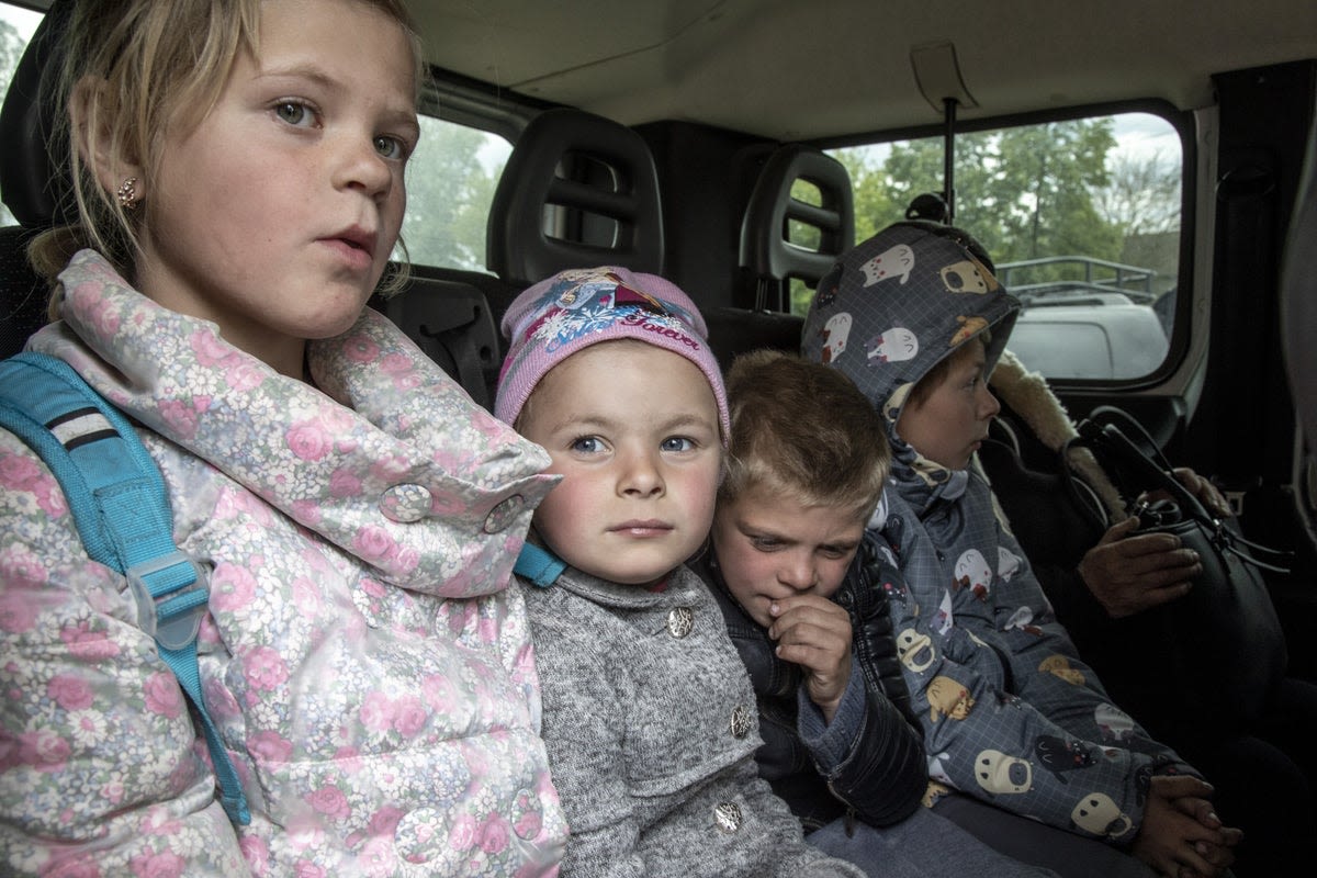 Inside the escape from a Ukraine border village as Putin’s forces closed in: ‘Mummy, when will this war end?’