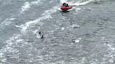Two people rescued in the Oswego River