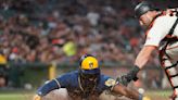 Pinch-runner Yelich scores winner in 10th, Brews beat Giants