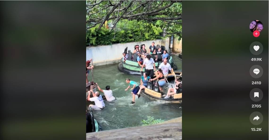 Riders jump off Roaring Rapids at Six Flags Over Texas to escape stuck raft in viral video