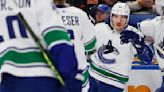 Horvat leads Canucks in 5-4 win over Sabres