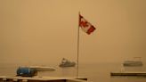 Canadian firefighters prevent more wildfire losses and step up defense of territorial capital